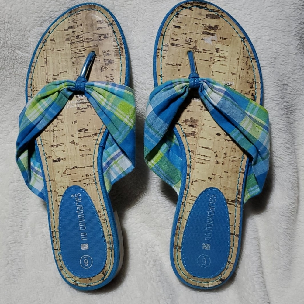 No boundaries,  blue, and green fabric  flip flops